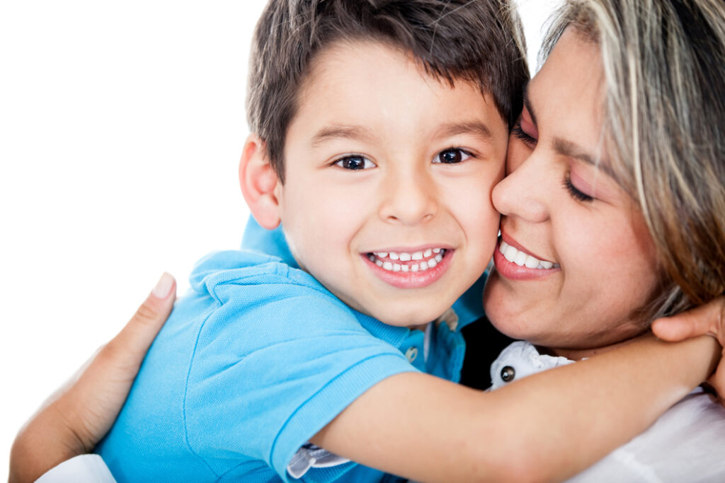 Son and mother hugging and smiling, Robert Wiest Child Custody attorney in Northern Colorado